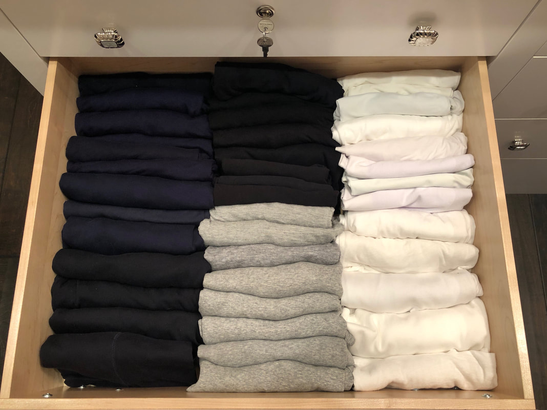 T-shirts folded in a drawer